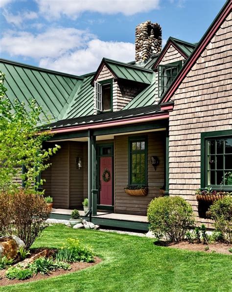 white exterior ranch house with green metal roof|house with green roof colors.